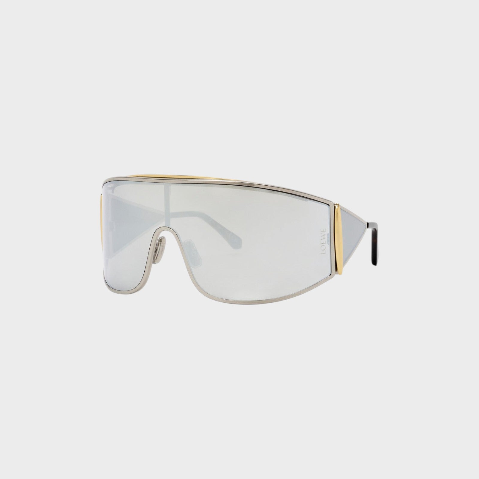 Tasoni Loewe metal shield shaped sunglasses with silver mirrored lenses and gold accents.