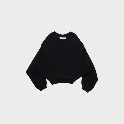 Tasoni Marie Adam-Leenaerdt black v-neck cropped sweater with embroidered logo on chest.