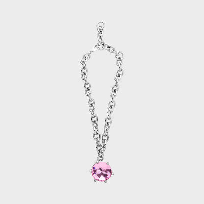 Tasoni Marie Adam-Leenaerdt necklace in brass with a large pink oval pendant and chunky silver chain.