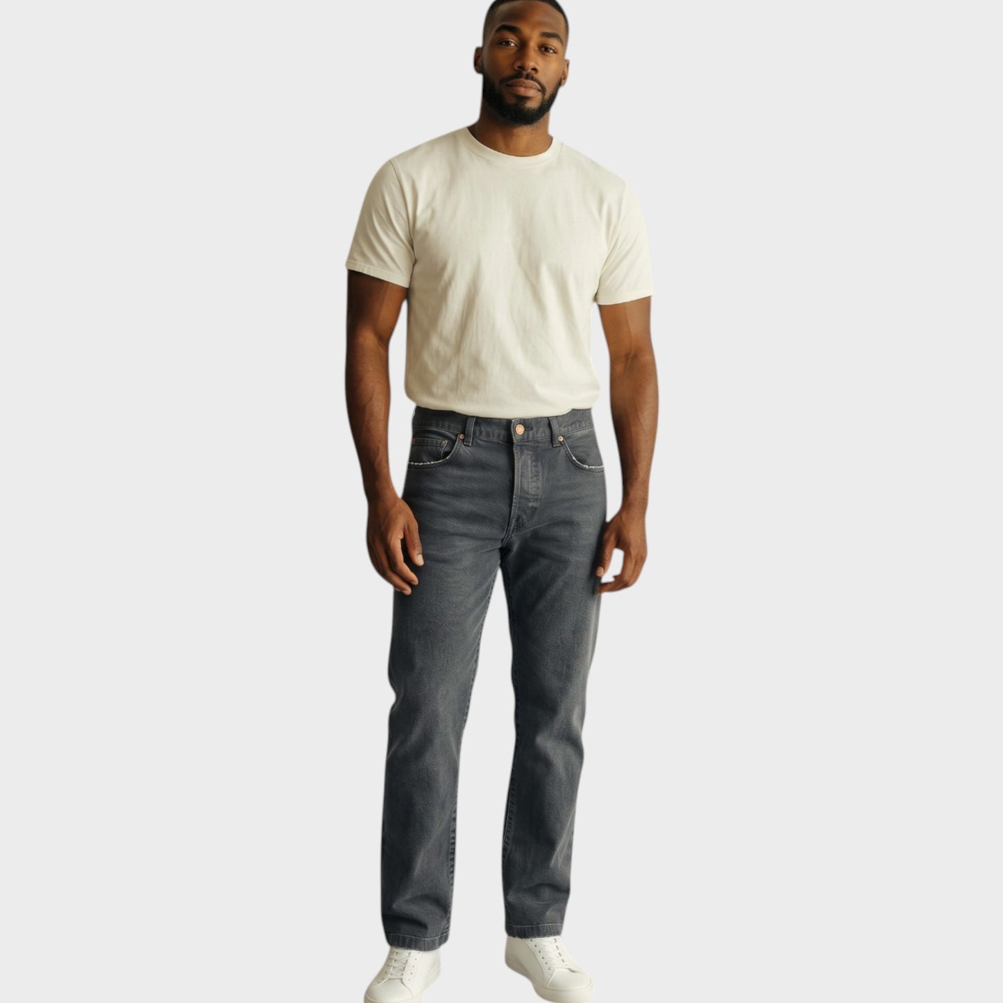 Model wearing Tasoni Massimo Alba Oceano classic denim pants in smoky grey with a white t-shirt and sneakers.