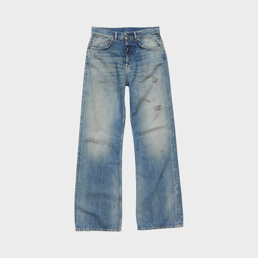 Tasoni mid blue cotton mid waist flare leg denim jeans with distressed details and a button fly.