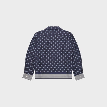 Tasoni navy blue long sleeve shirt with diamond pattern and striped hem and cuffs.
