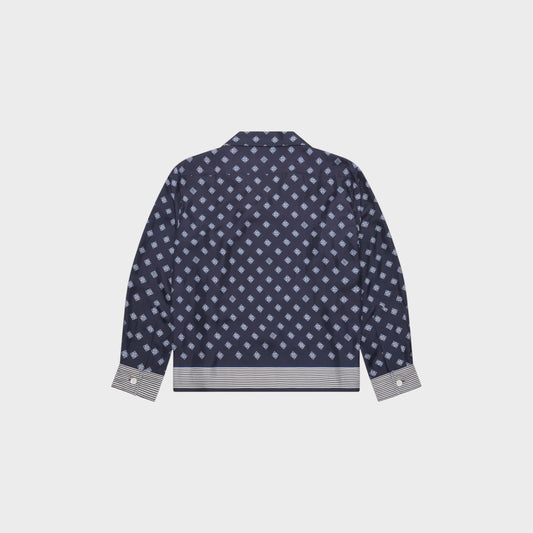 Tasoni navy blue long sleeve shirt with diamond pattern and striped hem and cuffs.