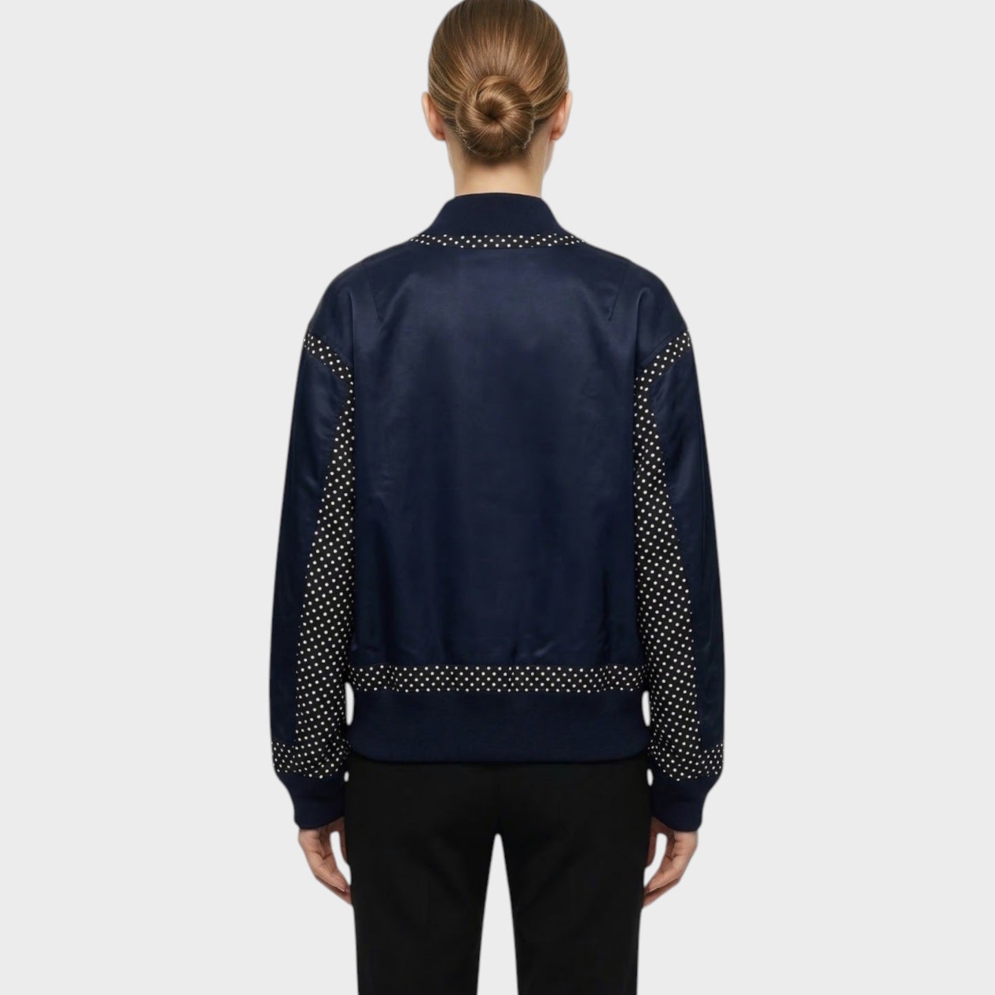 Tasoni navy satin bomber jacket with polka dot detail on sleeves and hem, zip-up front.