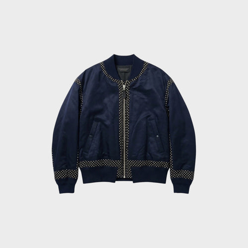 Tasoni navy satin bomber jacket with zip-up front and polka dot trim on collar, cuffs, and hem.