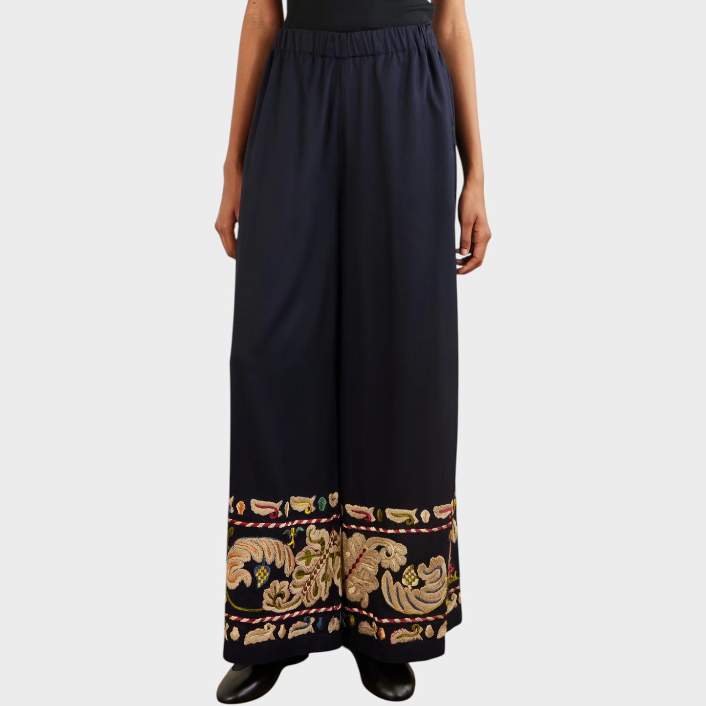 Tasoni navy blue wide leg runner pants with multi-colored feather embroidery on the hem.