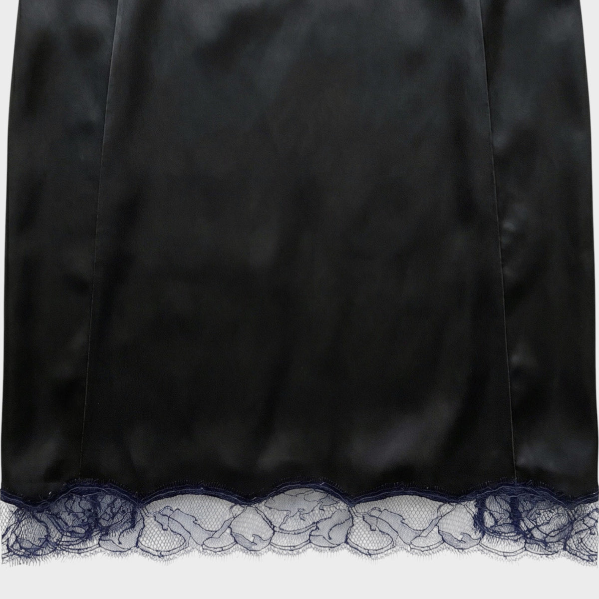 Tasoni Nina Ricci black silk camisole dress featuring a delicate dark blue lace hem detail.