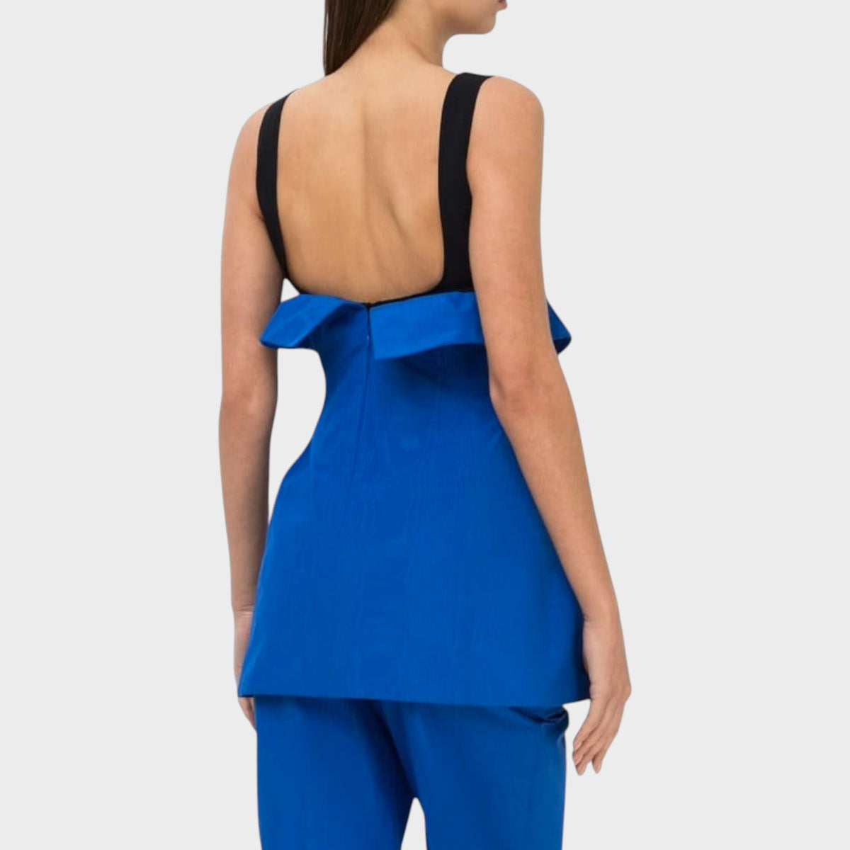 Tasoni Nina Ricci blue cotton tank top with a low back and black shoulder straps, shown from the back view.