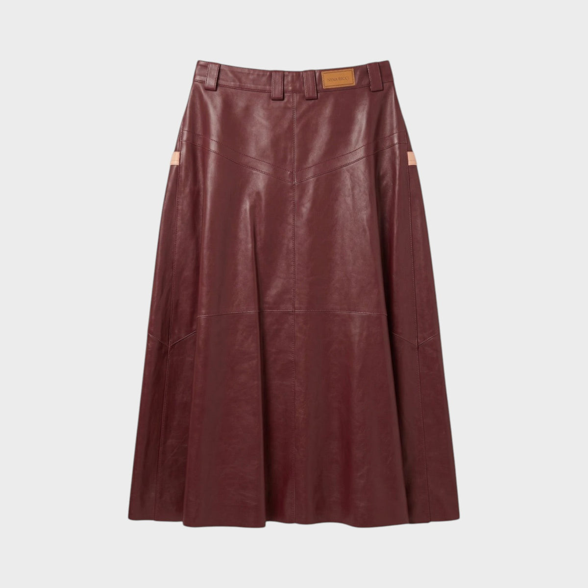 Tasoni Nina Ricci burgundy leather midi skirt with panelled construction and a high-waisted fit.