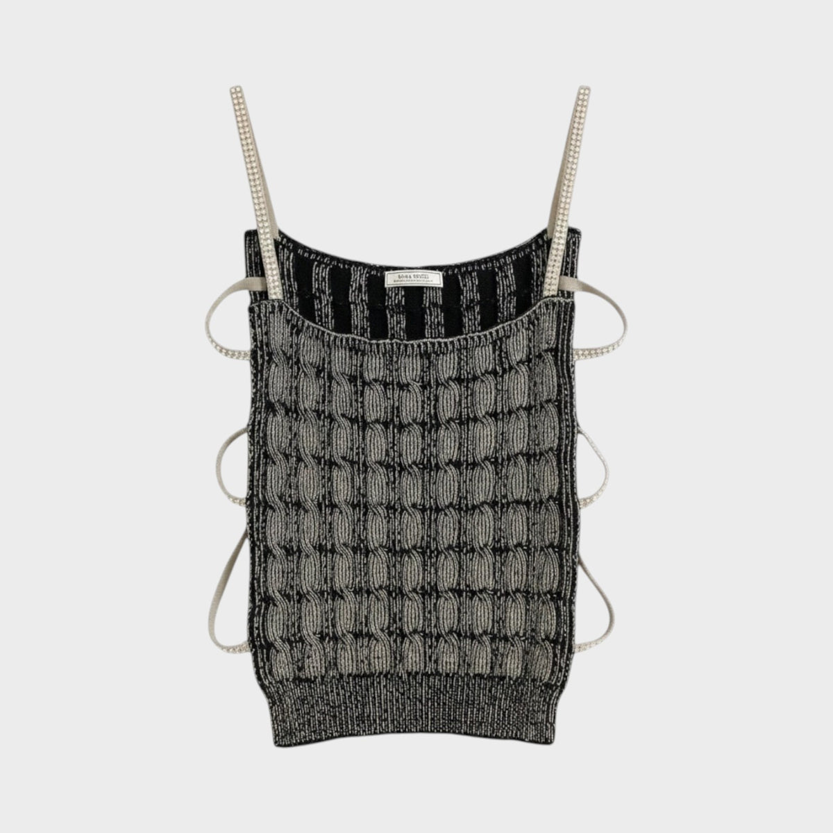 Tasoni Nina Ricci cropped knit top in black and silver with crystal-embellished straps and side cut-out details.