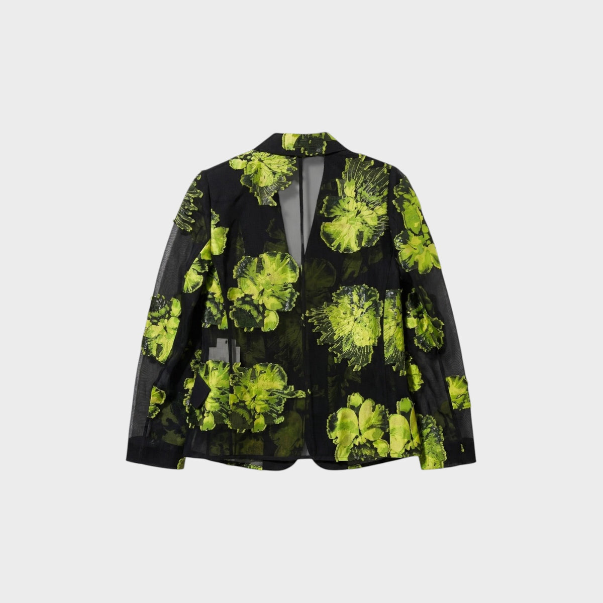Tasoni Nina Ricci black blazer featuring a vibrant green floral jacquard pattern on sheer silk gauze fabric