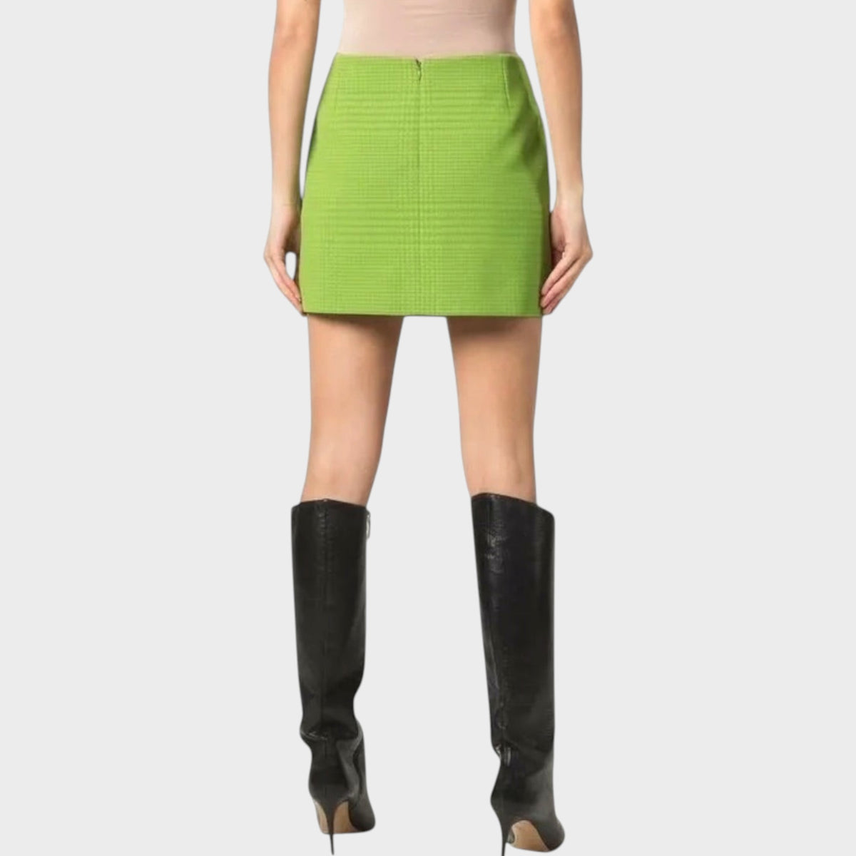 Tasoni Nina Ricci lime green houndstooth jacquard mini skirt worn by a model with black high-heeled boots, back view