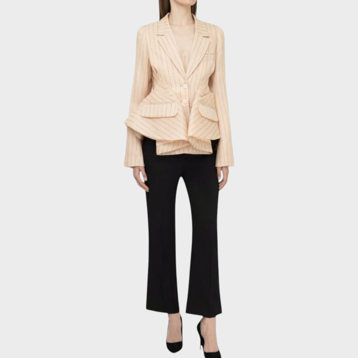 Tasoni Nina Ricci Natté beige striped pleated blazer with a peplum waist and button closure worn with black trousers