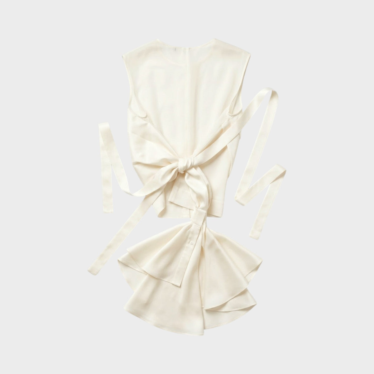Tasoni Nina Ricci cream technical silk tank top featuring an asymmetric tie-front design and draped hem detail.