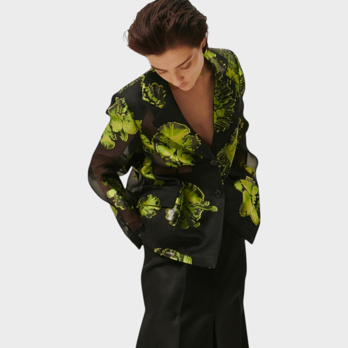 Tasoni Nina Ricci silk gauze blazer featuring a black and neon green floral jacquard pattern on a model