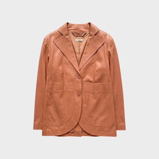 Tasoni Nina Ricci leather blazer in a warm terracotta hue featuring a notched lapel and two front patch pockets.