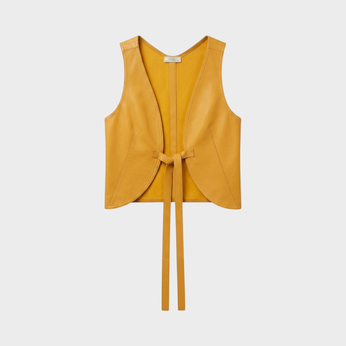 Tasoni Nina Ricci Miel yellow leather crop vest with a front tie closure and sleeveless design.