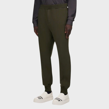 Tasoni olive green cotton elastic waist sweatpants with front seam detail and cuffed ankles.