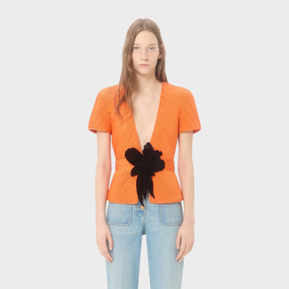 Tasoni orange pleated short sleeve jacket with V-neck and black floral detail