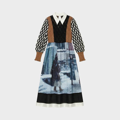Tasoni long sleeve midi dress with a pointed collar, featuring a patchwork design with brown and black knit sleeves and a print of figures in a snowy urban scene.