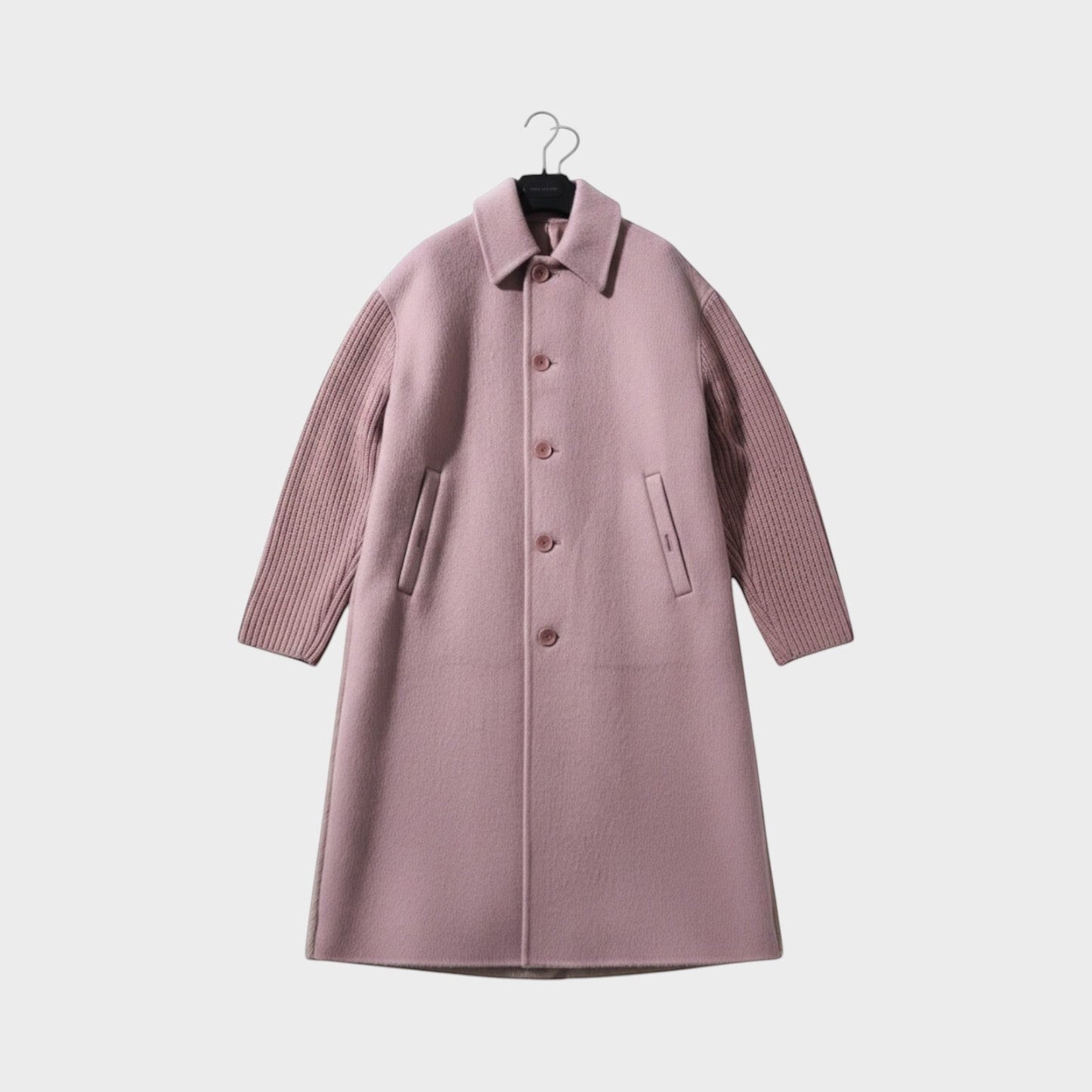 Tasoni dark pink cashmere blend coat with contrasting ribbed knit sleeves and button-up front.