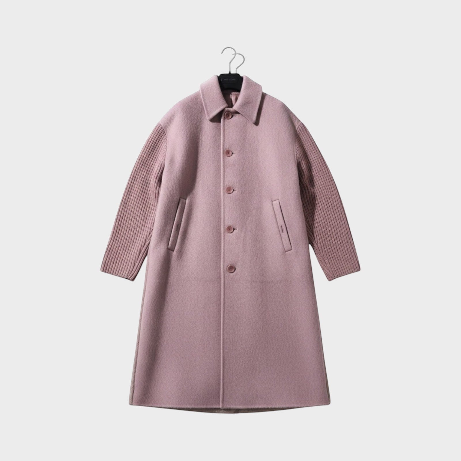 Tasoni dark pink cashmere blend coat with contrasting ribbed knit sleeves and button-up front.