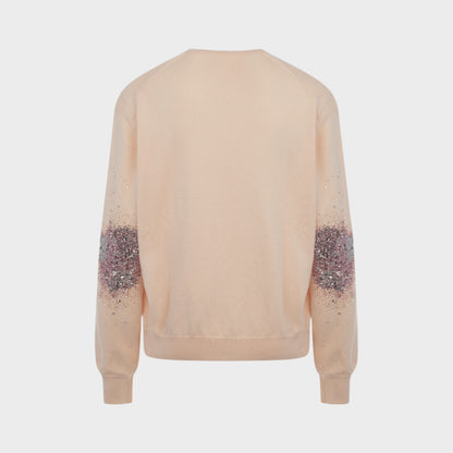 Tasoni pink knitwear sweater with glitter detail on sleeves. V-neck, long sleeves, and a relaxed fit.