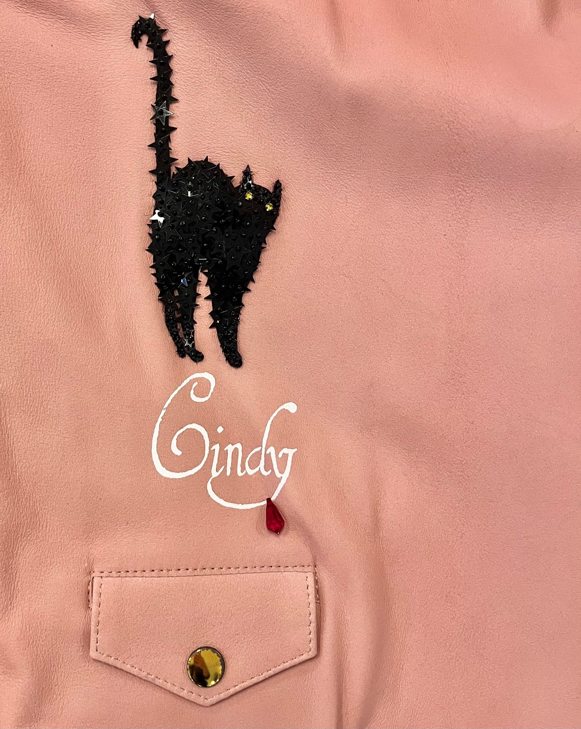 Tasoni pink leather coat with black sequin cat appliqué,