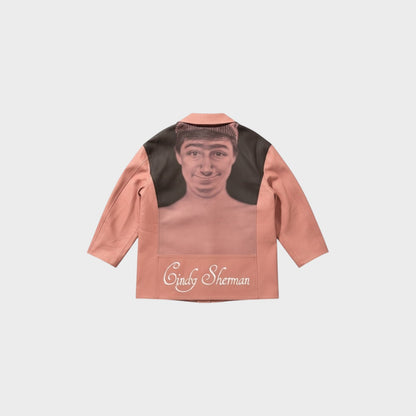Tasoni pink leather coat with a portrait appliqué on the back and