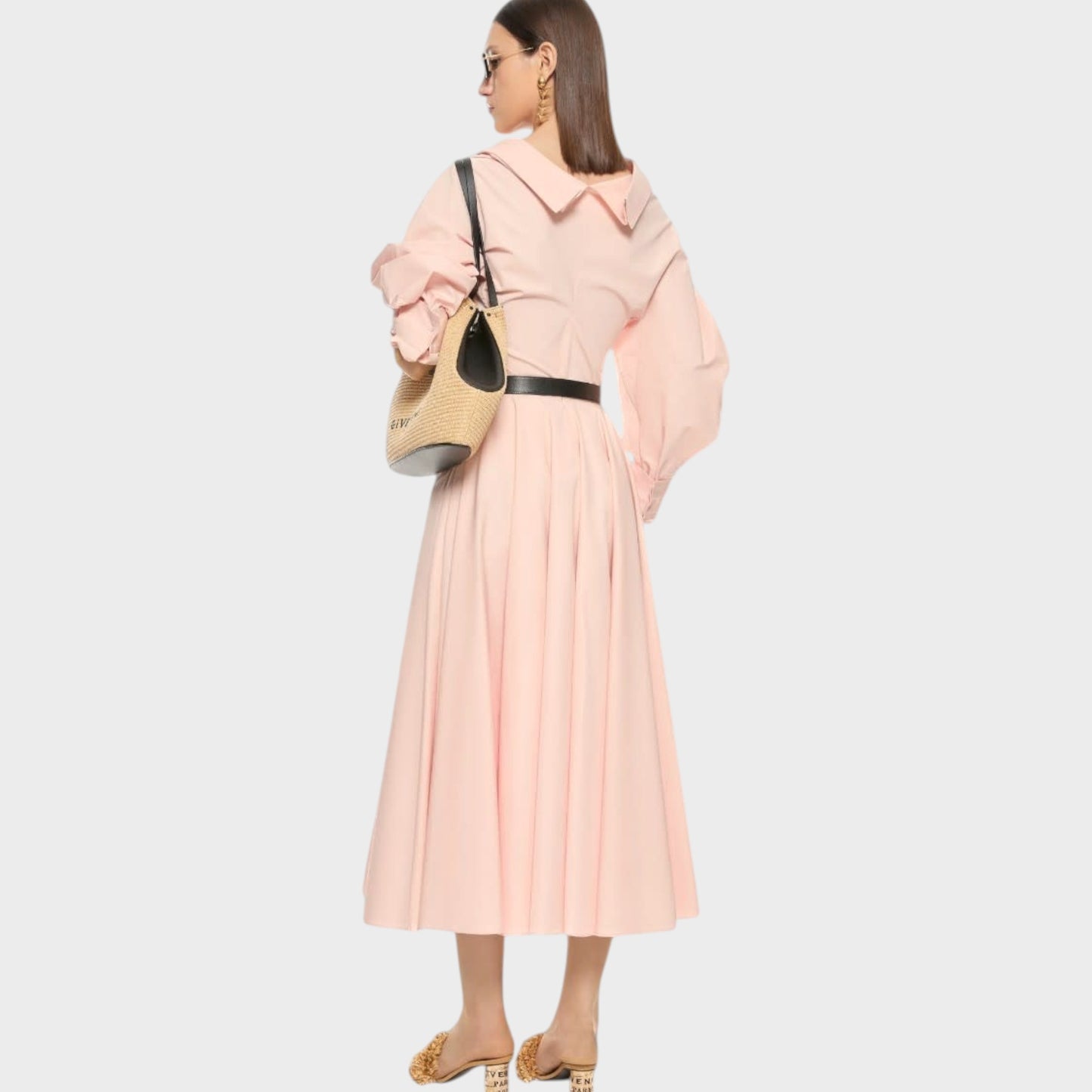 Tasoni pink silk poplin circular long skirt with a wide collar and puffed sleeves, cinched with a black belt.