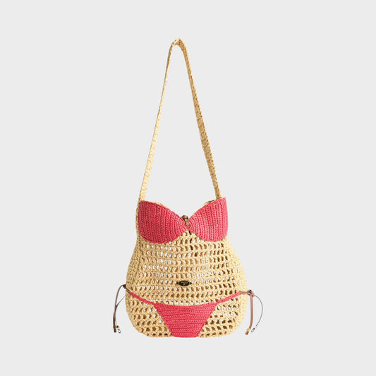Tasoni Pucci raffia shoulder bag in natural and pink, designed to resemble a bikini. Features a crochet knit body and strap, with pink crochet accents.