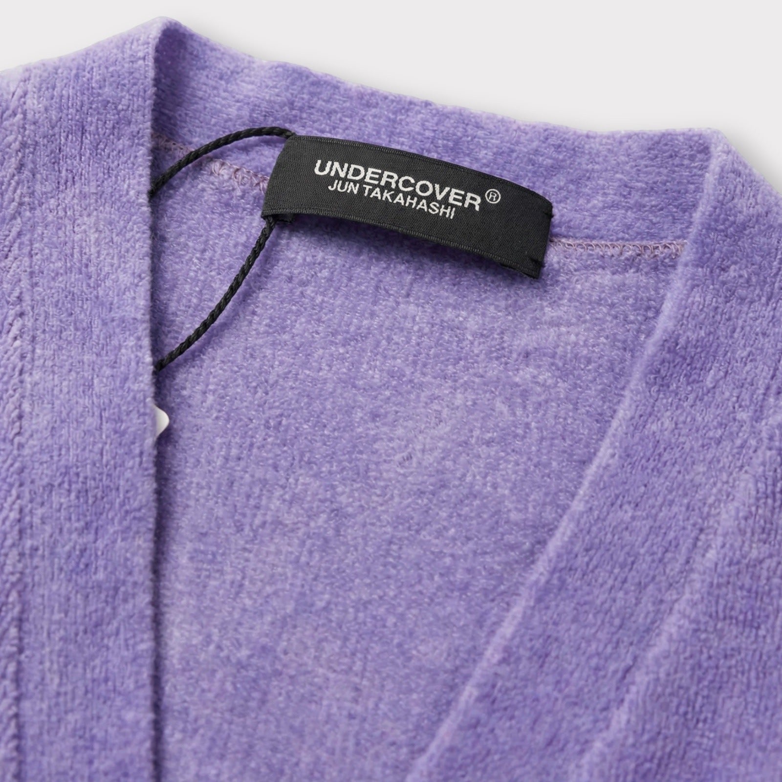 Tasoni Undercover Jun Takahashi purple v-neck knit cardigan with fuzzy texture.