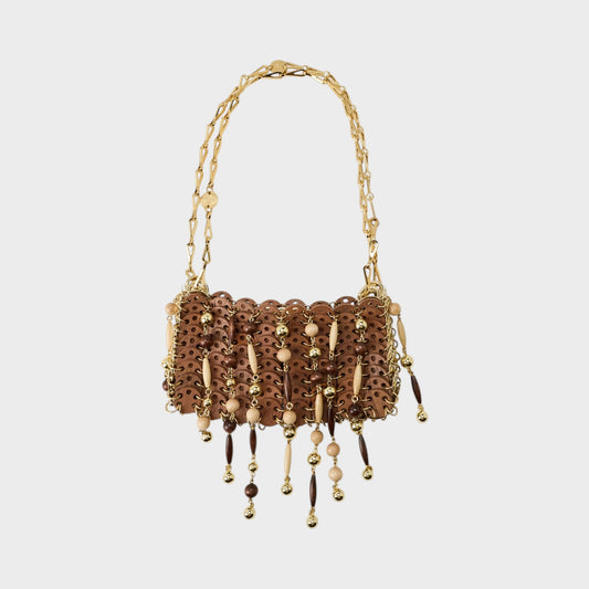 Tasoni Rabanne Wood Nano Bag featuring a structured wooden panel design with gold chain strap and beaded fringe.