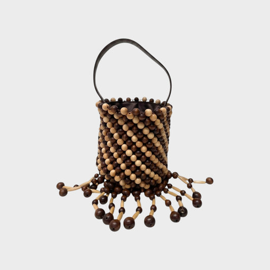Tasoni Rabanne bucket bag featuring a brown and beige wooden bead lattice design with dangling beaded fringe
