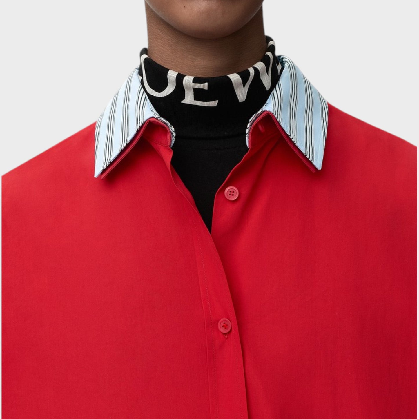 Tasoni red cotton shirt dress with a contrasting striped collar and a black turtleneck with white LOEWE logo.