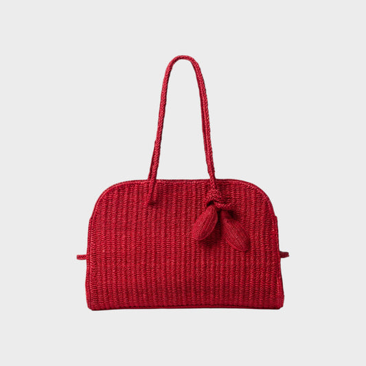 Tasoni red raffia tote bag with braided handles and a decorative knot detail.