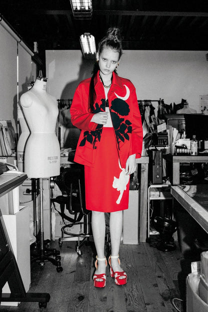Tasoni red jacket with black rose and moon print, paired with a matching red skirt featuring a white cat motif.