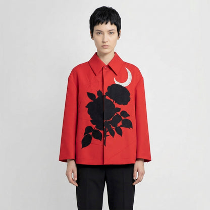 Tasoni red jacket with classic collar, button-up front, and black rose and moon motif.
