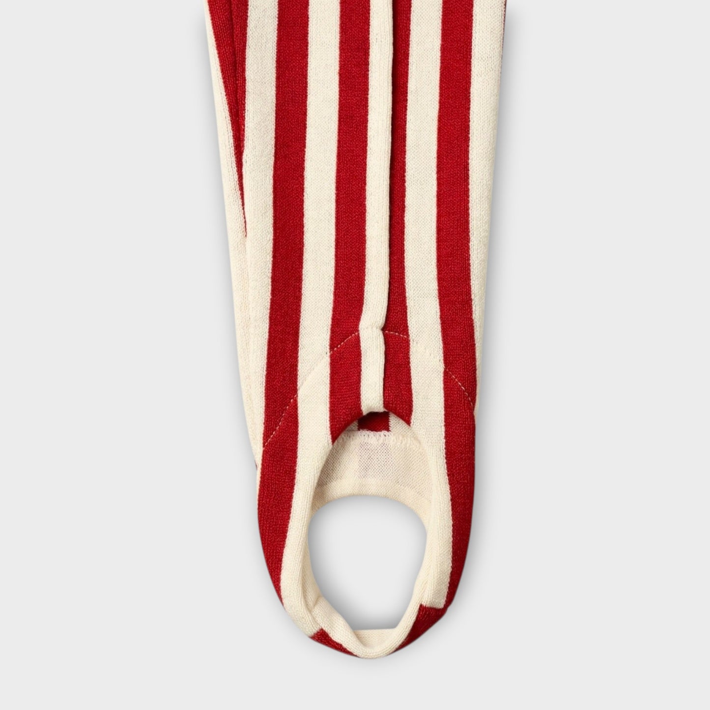Tasoni red and white striped wool trousers with elastic waist and foot straps.