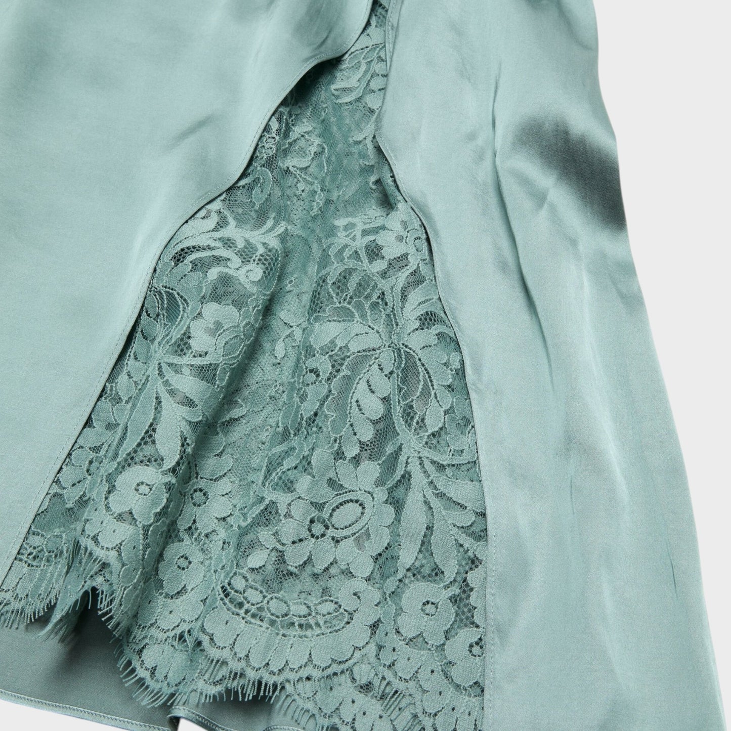 Tasoni sage green sleeveless slip midi dress with lace panel detail and frayed hem.