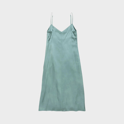 Tasoni sage green sleeveless slip midi dress with thin straps and a V-neckline, featuring delicate lace trim.