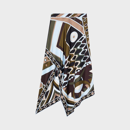 Tasoni long silk scarf skirt in khaki, blue, brown, and black abstract geometric print with Vivara pattern.