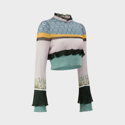 Tasoni Undercover Silk Top with a high neck, ruffles, and a colourful striped pattern. Features flared sleeves with a scenic print.