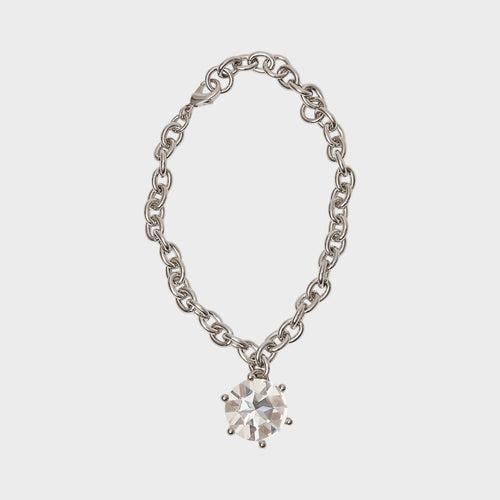 Tasoni Marie Adam-Leenaerdt silver brass necklace with a clear crystal pendant.