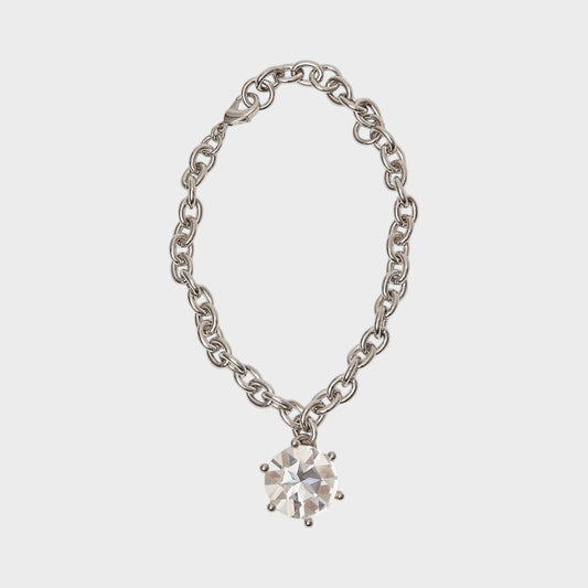 Tasoni Marie Adam-Leenaerdt silver brass necklace with a clear crystal pendant.