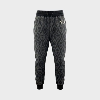 Tasoni Undercover x VLTN black and grey cotton drawstring sweatpants with all-over pattern and gold 'VJ' logo.