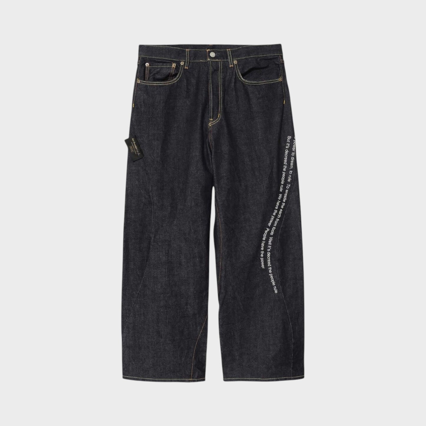 Tasoni x Undercover Patti Smith wide leg indigo denim pants with embroidered poem detail.