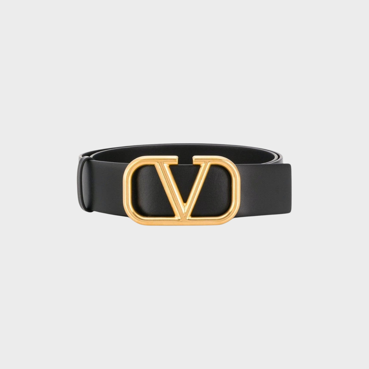 Tasoni Valentino V Logo belt in black leather with a polished gold-tone metal buckle on a light grey background.