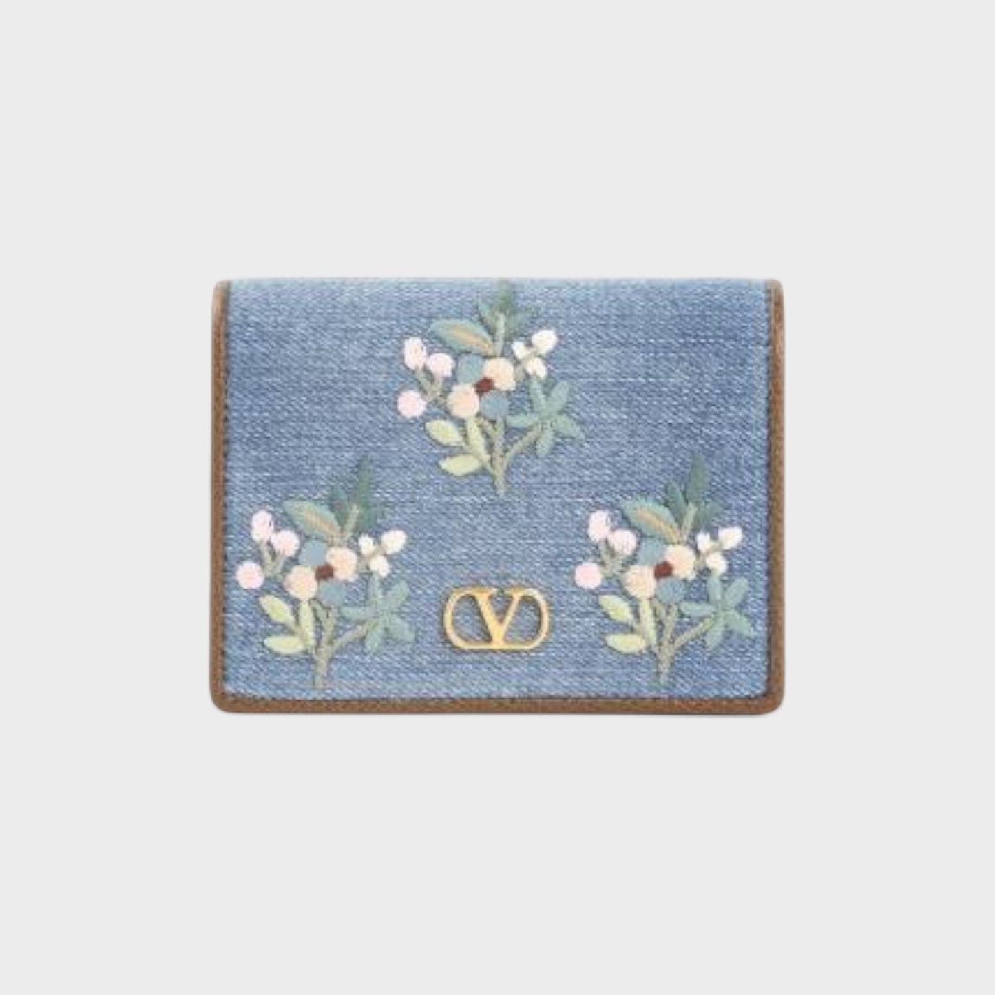 Tasoni Valentino blue denim wallet with floral embroidery and V-logo signature.