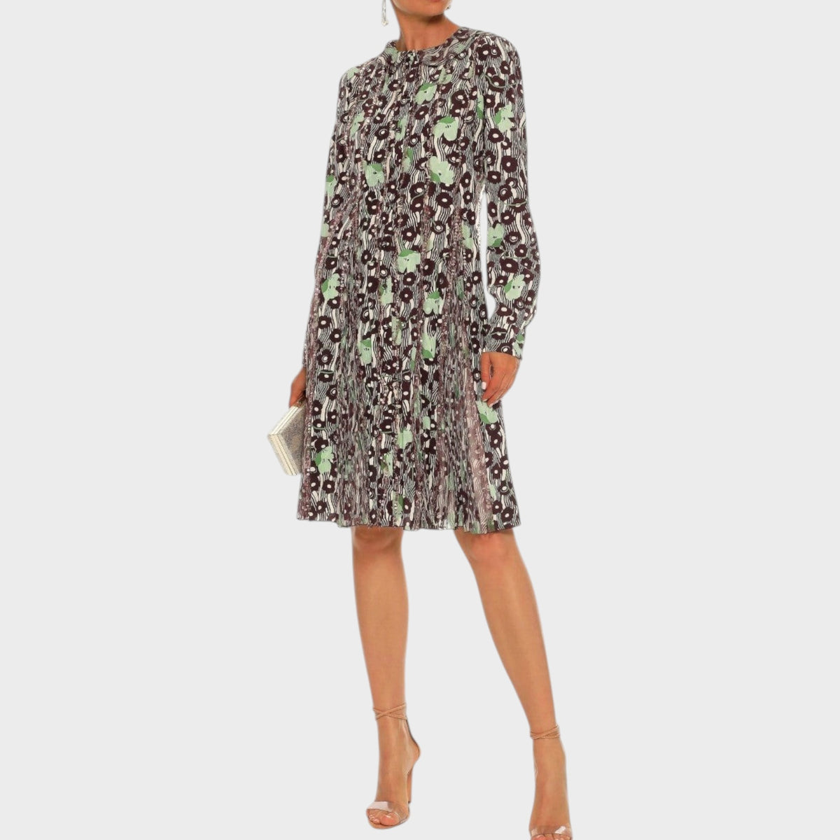 Tasoni Valentino knee-length dress featuring a dark floral print with green accents and pleated skirt details
